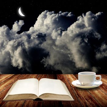 Open book and drink coffee at night, Read concept