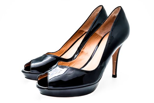 Pair of black dress women shoes isolated over white
