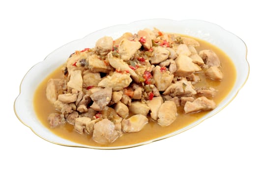 tray of chicken chopped and stewed with a Spanish sauce based on onion and garlic pepper and isolated with clipping path