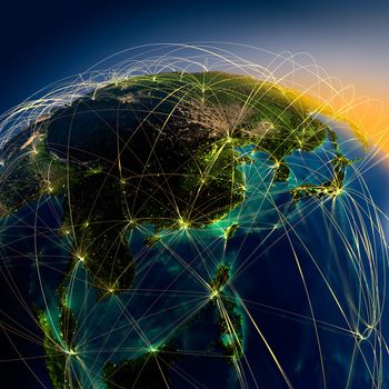 Highly detailed planet Earth at night with embossed continents, illuminated by light of cities, translucent and reflective ocean. Earth is surrounded by a luminous network, representing the major air routes based on real data