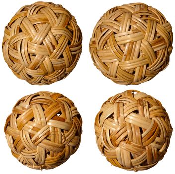 Set of brown woven bamboo balls on white background
