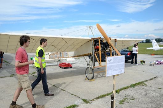 SZYMANOW, POLAND - AUGUST 25: copy of wooden plane Bleriot XI - the first plane which flied over La Manche canal. Replica presented on August 25, 2012 in Szymanow.