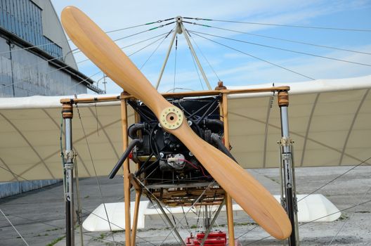 SZYMANOW, POLAND - AUGUST 25: copy of wooden plane Bleriot XI - the first plane which flied over La Manche canal. Replica presented on August 25, 2012 in Szymanow.