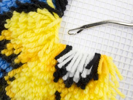 Latch Hook Rug stitch with canvas and yarn