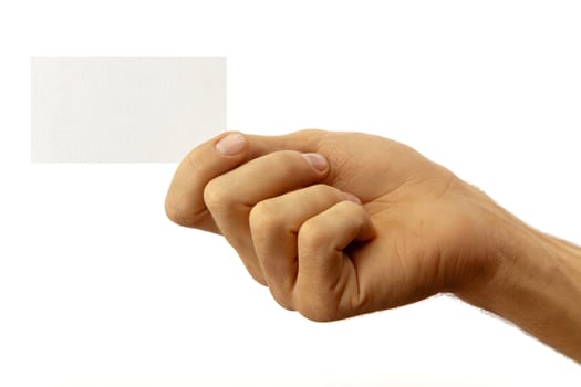 The hand of man shows a business card. Isolated on white