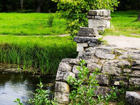 ruins on the lake in the park