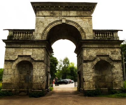 ancient gate in an arch entrance to the park