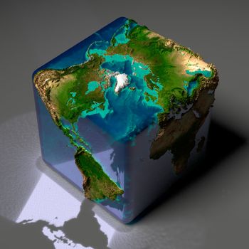 Earth is a cube with translucent water of the oceans and highlights of reflected light on a gray background table