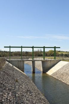 Almost finished sluice gate in the water diversion canal upstream the Alvito reservoir near Oriola village, part of the Alqueva Irrigation Plan, Alentejo, Portugal