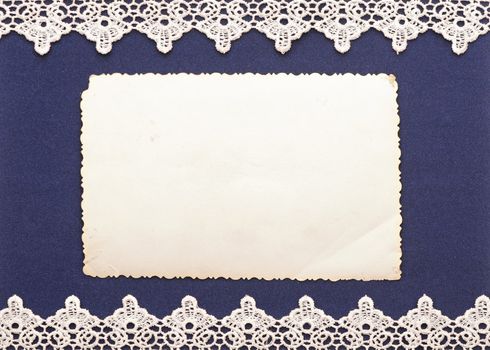 Retro background or greeting card with old photo and lacy border