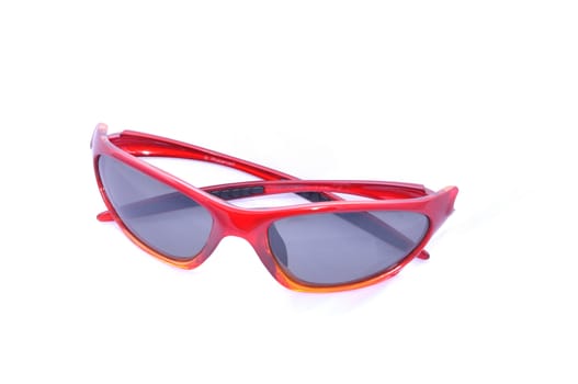 Red sunglasesses for sport activity with polarized lenses, isolated on white.