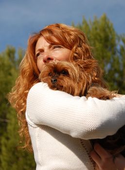 beautiful woman and her purebred yorkshire terrier