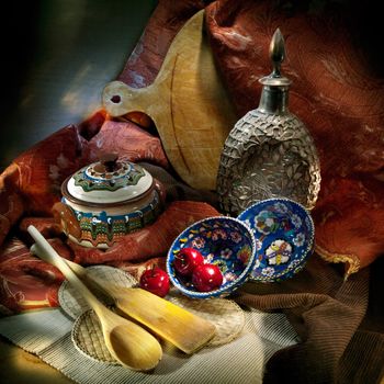 Still life of kitchen items, magically illuminated by light.