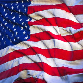 Flag of the United States, fluttering in the breeze, backlit rising sun. Sewn from pieces of cloth, a very realistic detailed state flag with the texture of fabric fluttering in the breeze, backlit by the rising sun light