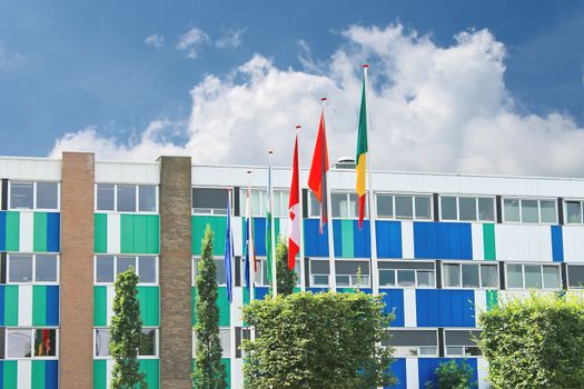 Several flags near the office building