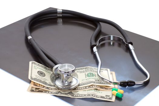 Composition of stethoscope, x-ray, dollars and pills image