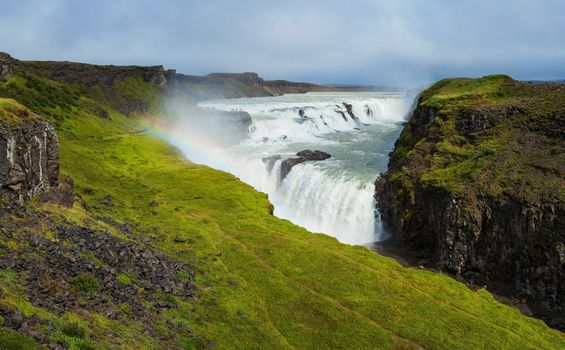 Scenic waterfall Gullfoss in iceland with rainbow
