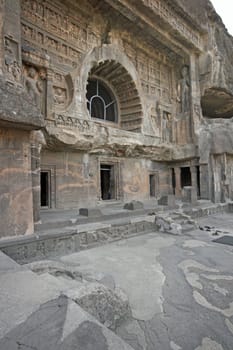 Facade of ancient Buddhist rock temple (Mahayan Chaitya-Griha Cave Temple) Cave 26 Ajanta near Aurangabad India. 5th-6th Century AD.