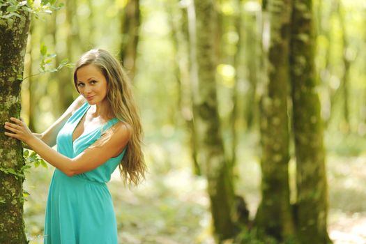 woman in summer forest