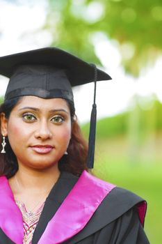 Young Asian Indian female smiling outdoor