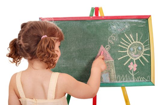 little girl drawing on board