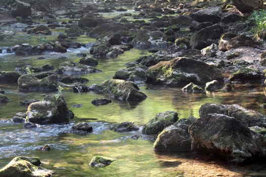 mountain creek with stones