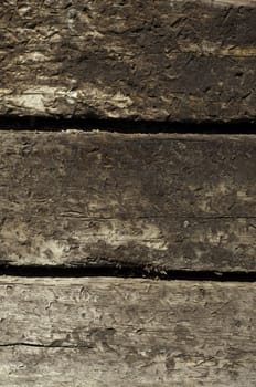 three stacked railroad ties in portrait position for texture or background
