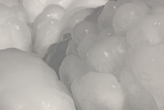 smooth round ice frozen in winter close-up