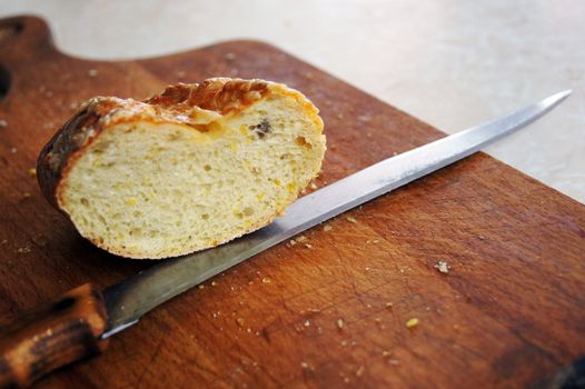 Bread and knife on the board