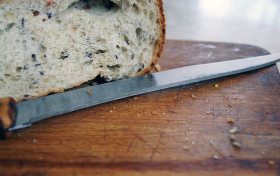 Bread and knife on the board