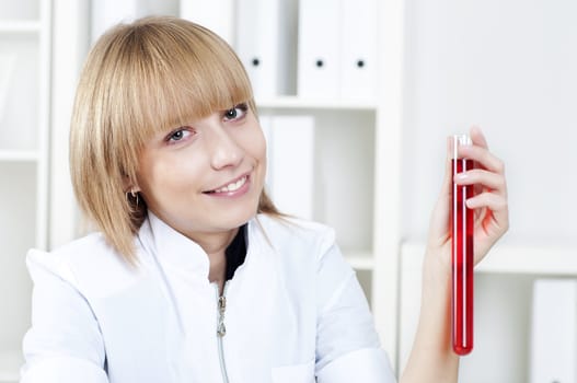 chemist working in the laboratory, mix liquid