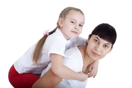 portrait of mom and daughter playing together, isolated on white