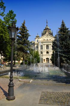 City Hall of slovakian city Kosice with fountains and lantern in front of it