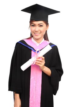 young woman with graduation cap and gown with arm raised holding diploma