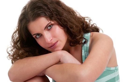 Woman sitting on the floor, resting, isolated in a white background