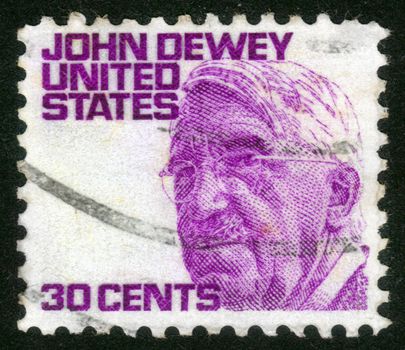 USA - CIRCA 1965: A stamp printed in USA from the "Prominent Americans (1st series)" issue shows philosopher John Dewey, circa 1965.