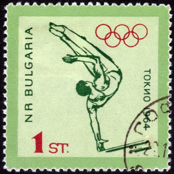 Bulgaria - CIRCA 1964: A stamp printed in Bulgaria shows Gymnastics men with the inscription "Tokyo, 1964", series "XVIII Summer Olympic Games, Tokyo, 1964", circa 1964