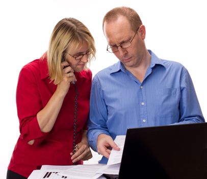 Two business people working