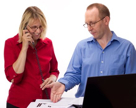 Two business people working