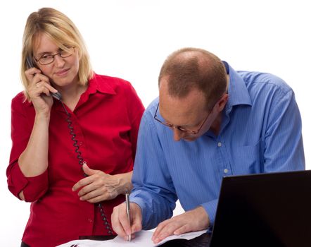 Two business people working