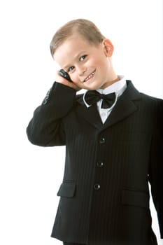 Boy holding a cellphone isolated on white background