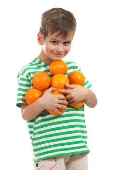 Boy holding oranges isolated on white background