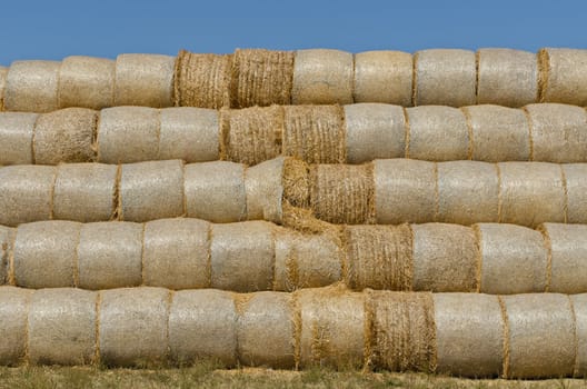 a stack of hay bales, horizontal shot