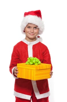 Boy holding a christmas gift isolated on white background