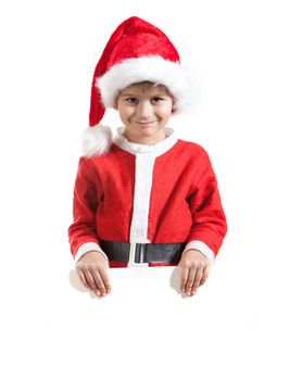 Boy holding a christmas poster isolated on white background