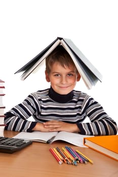 Cute schoolboy isolated on a white background