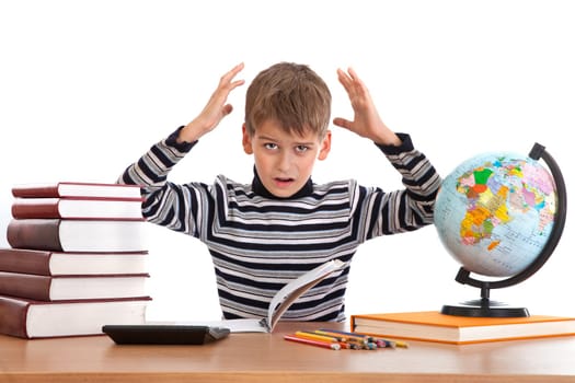 Tired schoolboy isolated on a white background