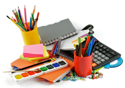 School supplies. Ballpoint Pens, Colored Pencils, Paintbrush, Felt Tip Pens, Pencil Sharpener, Watercolor Paints, Paper Clips, Calculator, Stapler, Ruler, Protractor, Notebooks and Sticky Notes