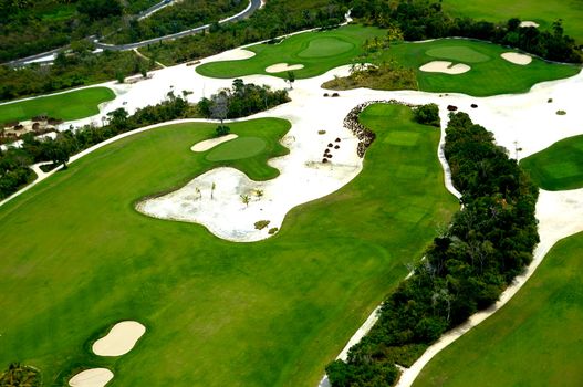 Flying above a golf course at an exotic destination