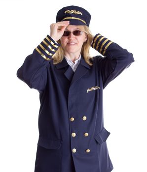 Female pilot putting on her cap